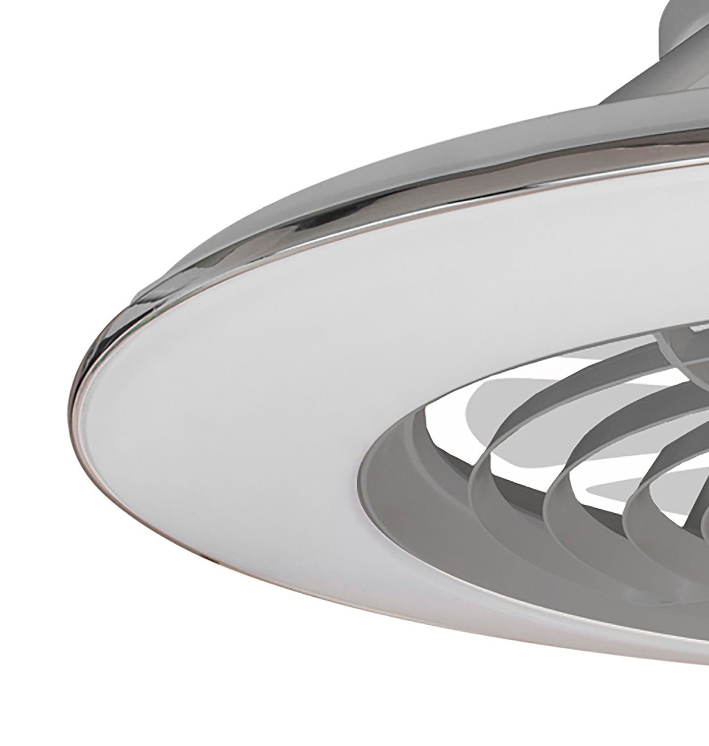 A close-up view of a modern ceiling fan with a sleek, circular design and silver blades housed within a white frame, showcasing its contemporary style. The Ceiling Fans UK Alisio XL Silver Ceiling Fan with Light 73.5cm features curved blades, an LED dimmable ceiling light, and compatibility with Alexa/Google Voice Control. It also includes a remote control and app support, providing both convenience and sophisticated functionality.