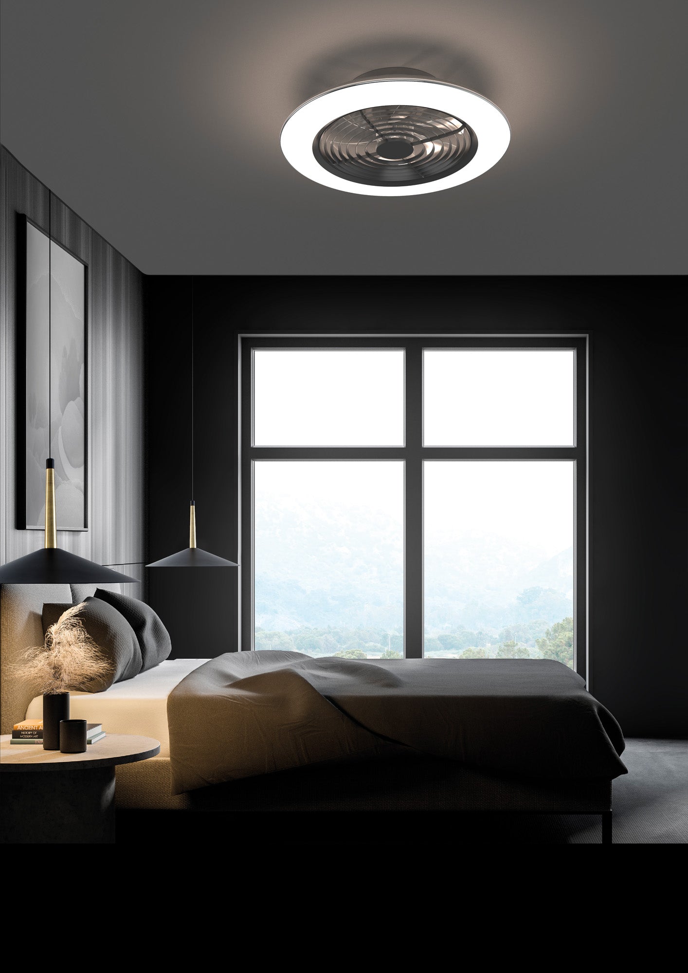 A modern bedroom with dark walls and a large window showcasing a scenic mountain view. The room features a bed with a gray bedspread, an Alisio XL Black Ceiling Fan with Light 73.5cm 95W LED Dimmable Ceiling Light & 58W DC Reversible Fan by Ceiling Fans UK, equipped with remote control, app support, and Alexa/Google voice control capabilities. The minimalist decor includes a side table with a decorative lamp and a hanging LED dimmable light fixture.